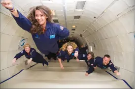  ?? Canadian Press/Steve Boxall, Zero Gravity Corporatio­n photos ?? People float in a zero-gravity airplane in an undated handout photo. About two dozen affluent Canadians are among hundreds of eager travellers who may become space tourists in the coming months.