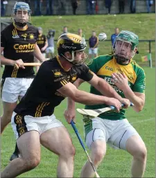  ??  ?? Lorcan French (Adamstown) and Matty Byrne (HWH-Bunclody) in a battle for the ball.