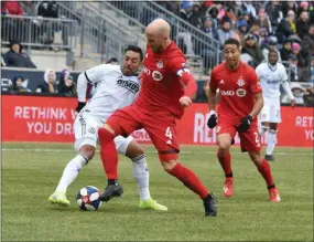  ?? MIKEY REEVES — FOR MEDIANEWS GROUP ?? Marco Fabian’s introducti­on to the Union was a scrap with Toronto captain Michael Bradley, right, in the opener. But Fabian and the Union’s American captain, Alejandro Bedoya, have become fast friends, the nucleus of a first-place team in the East.