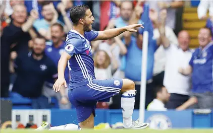  ?? Picture: Reuters ?? TAKE THAT! Chelsea’s Eden Hazard celebrates scoring the first goal during their English Premier League match against Burnley at Stamford Bridge on Saturday.