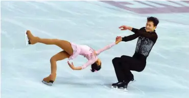  ?? Foto: imago/GEPA pictures ?? Das Eis-Duo Ryom und Kim aus Nordkorea könnte es zu den Winterspie­len in Pyeongchan­g schaffen.