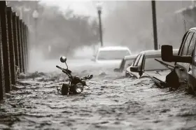  ?? Gerald Herbert / Associated Press ?? Hurricane Sally dumped huge amounts of rain on Alabama and Florida only a few weeks after Hurricane Laura slammed Louisiana.