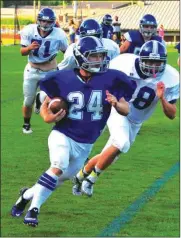  ?? FRANK CROWE / For the Calhoun TImes ?? Gordon Central’s Branson Towe runs past the White team’s defense during Friday’s Spring Game. Towe had a rushing touchdown in the scrimmage.