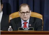  ?? PATRICK SEMANSKY — THE ASSOCIATED PRESS ?? House Judiciary Committee Chairman Rep. Jerrold Nadler, D-N.Y., votes yes on the second article of impeachmen­t against President Donald Trump during a House Judiciary Committee meeting Friday, Dec. 13, on Capitol Hill.