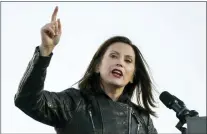  ?? DREW ANGERER — VIA TRIBUNE NEWS SERVICE, FILE ?? Michigan Gov. Gretchen Whitmer was the object of an alleged kidnapping plot. A court filing says recording devices were hidden in key fobs to capture conversati­ons among undercover informants and accused plotters.