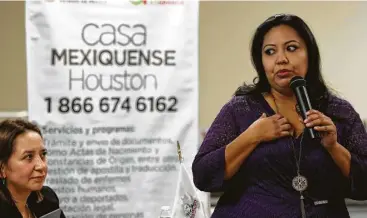 ?? Karen Warren / Houston Chronicle ?? Maria Villegas, right, addresses a meeting of the Be Foundation, an organizati­on that is trying to help Mexican immigrants who were never registered in their country of origin to gain identifica­tion status.