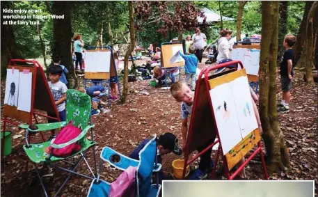  ?? Kids enjoy an art workshop in Tarbert Wood at the fairy trail. ??