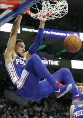  ?? LAURENCE KESTERSON — THE ASSOCIATED PRESS ?? The Sixers’ Ben Simmons dunks during the second half Bulls on Wednesday. The 76ers won 115-101. against the
