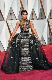  ?? Frazer Harrison / Getty Images ?? Janelle Monae makes an entrance in a princess-style Eli Saab.