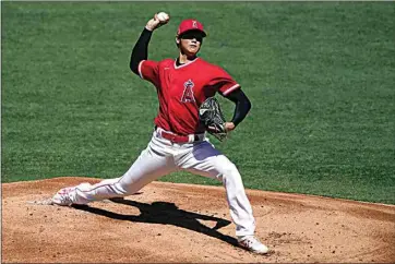  ?? ASHLEY LANDIS / AP ?? The Angels’ Shohei Ohtani pitches during an intrasquad game Tuesday at Angel Stadium in Anaheim.