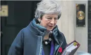  ?? /Bloomberg ?? Stalled talks: Theresa May, UK prime minister, departs number 10 Downing Street on her way to parliament in London.