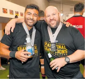  ?? Photo / Photosport ?? Richie Mo'unga and Jason Ryan celebrate after the Crusaders' victory in the Super Rugby Pacific final.