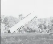  ?? COURTESY ?? An unmarked truck dumping the mysterious pile just beyond Pascal Goux’s back field