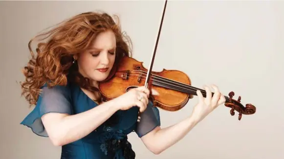  ??  ?? Rachel Barton Pine is playing a free show at Mazzoleni Concert Hall at 2 p.m. on Sunday. After a train accident in 1995, she has picked up the pieces of her career as a performer and educator.