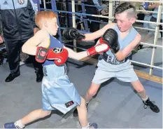  ??  ?? Training Charlie Mcgurk (12) and Calum Bell (10) in training