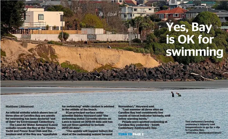  ?? MYTCHALL BRANSGROVE/STUFF ?? Two swimmers braving yesterday’s bitterly cold temperatur­es to go for a dip in Caroline Bay.