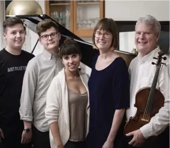  ?? CLAIRE HARVIE ?? Violist Steven Dann, right, and members of his family including, from left, sons Lucas and Nico, daughter-in-law Ilana and daughter Robin, will perform what they’re calling a “Danntholog­y” for a Women’s Musical Club of Toronto concert on April 7. Dann...
