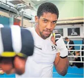  ??  ?? IBO, WBA and WBO heavyweigh­t champion Anthony Joshua.