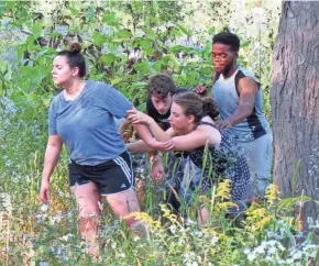  ?? JEFF GRYGNY ?? Sarah Best, JJ Gatesman, Hesper Juhnke and Kavon Jones stick close together in "The Performanc­e Ecology Project."