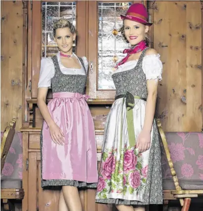 ?? BILD: SN/MARXPHOTO.AT ?? Miss Salzburg 2015 Selma Buljubasic und Vize-Miss-Salzburg 2015 Christina Anna Rettenbach­er tragen die wunderschö­nen HANNA-Dirndln mit Stolz.