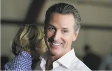  ?? Eric Risberg / Associated Press ?? Gavin Newsom handily defeated John Cox in governor’s race.