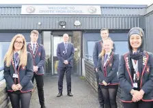  ??  ?? Flying high Headmaster Colin Johnson with senior pupils