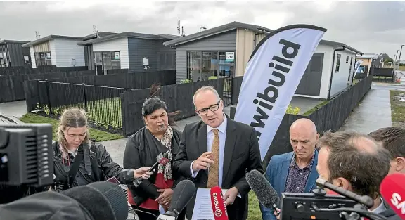  ?? PETER MEECHAM/ STUFF ?? Housing Minister Phil Twyford talks about the process around KiwiBuild in Papakura, Auckland, where the first affordable homes were built.