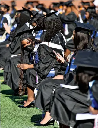  ??  ?? RISK AND REWARD (Left) College loan expert Betsy Mayotte, who likens the current situation with parent debt to the 2008 mortgage crisis. (Below) Graduation at Spelman College, where the typical parent borrows nearly $85,000 to put their child through school.