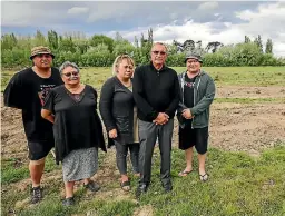  ?? JOHN COWPLAND / ALPHAPIX ?? Peter Robin, Victoria Robin, Horiana Robin, Api Robin and Mark Robin on the land on which they are building papakainga housing for their whole wider whanau.