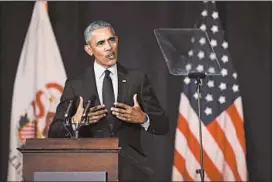  ?? SCOTT OLSON/GETTY ?? Former President Barack Obama compares President Donald Trump to foreign demagogues who exploit “a politics of fear.” Trump says Obama’s speech put him to sleep.