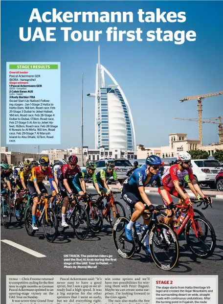  ?? Photo by Neeraj Murali ?? oN TrACK: The peloton riders go past the Burj Al Arab during the first stage of the UAE Tour in Dubai. —