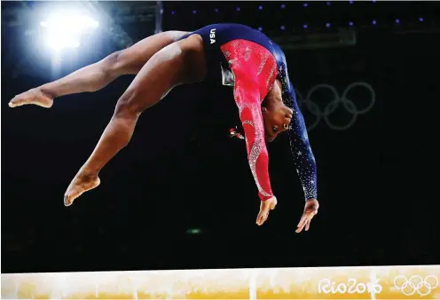  ?? Foto: AFP/Emmanuel Dunand ?? Simone Biles ist die überragend­e Turnerin der Gegenwart.