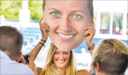  ?? Peter Hvizdak / Hearst Connecticu­t Media file photo ?? Petra Kvitova holds her photograph during a promotiona­l event during the Connecticu­t Open Tennis Tournament in 2017