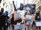  ?? PAT NABONG/SUN-TIMES ?? Hundreds march in a Black Lives Matter protest in the Loop on the Fourth of July.