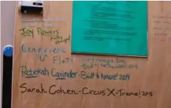  ??  ?? A cabinet door inside a clown's living quarters on the train displays messages and signatures from past clowns who have lived in that room.