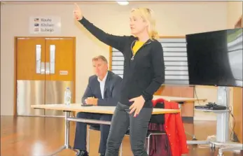  ??  ?? Nikki Kaye, with Northland MP Matt King behind her, explaining National’s issues with the education review to an audience in Kaitaia.