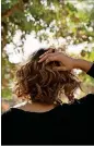  ?? SARAHBETHM­ANEY/ THE NEWYORK TIMES ?? Mia Birdsong is one of manywomen in the U. S. who have changed their hair routines and stocked up onmultiple­wigs.