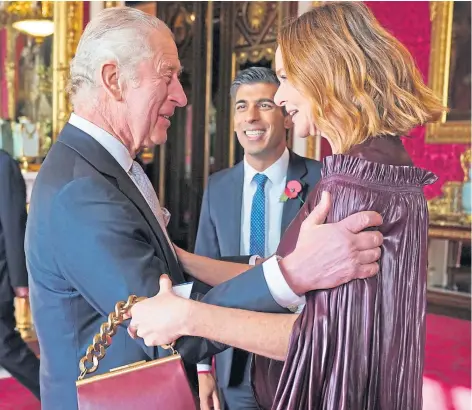  ?? ?? King Charles greets PM Rishi Sunak and fashion designer Stella Mccartney at a reception at Buckingham Palace ahead of Cop27 on Friday
Picture Jonathan Brady