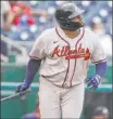  ?? Alex Brandon The Associated Press ?? Pablo Sandoval watches his two-run homer in the seventh inning of the Braves’ 2-0 win Wednesday at Nationals Park.