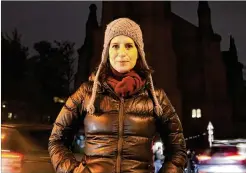  ?? ?? Actress Stefanie Hoener attends a Jan. 24 counter-rally against antivaccin­ation activists in front of the famous Gethsemane Church in Berlin, where she attends weekly vigils now staged by a neighborho­od group.