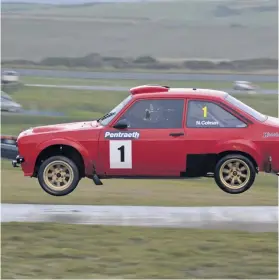  ??  ?? Flying high:ford Escort Mk2 crew eventually won by nearly four minutes