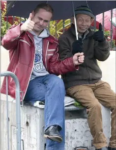  ??  ?? Karel Vrsan and Danny Ng find a good perch on the end of a closed Sidmonton Road.