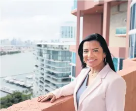  ?? ALIE SKOWRONSKI askowronsk­i@miamiheral­d.com ?? Portofino Tower general manager Damaris Cabrera has sharply boosted wages to hire and retain workers at the luxury condo building. ‘Someone with no experience asks for more money than people with experience,’ she says.