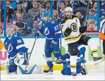  ?? CHRIS O’MEARA/AP PHOTO ?? Bruins center Patrice Bergeron (37) celebrates his goal in the second period of Saturday’s Stanley Cup playoff game against the Lightning at Tampa, Fla. The Bruins won 6-2.