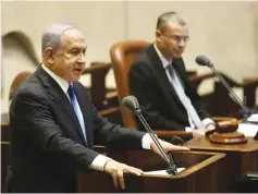  ?? (Marc Israel Sellem/The Jerusalem Post) ?? OPPOSITION LEADER Benjamin Netanyahu addresses the Knesset plenum yesterday.