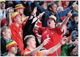  ?? ?? ON SONG The Welsh supporters were in full voice throughout last night’s contest