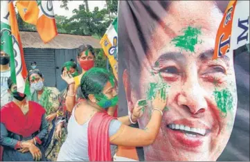  ?? PTI ?? Trinamool Congress supporters celebrate their party’s victory in the assembly elections, in South Dinajpur district on Sunday.