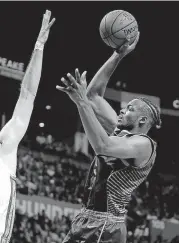  ?? [PHOTO BY BRYAN TERRY, THE OKLAHOMAN] ?? Oklahoma City’s Jerami Grant shoots during the Thunder’s game vs. Sacramento on Sunday.