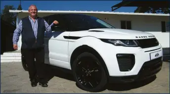  ??  ?? General Manager, Steven Silber proudly standing with one of their quality pre-owned vehicles.