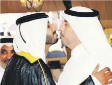  ?? Image taken from social media ?? Left, Abdullah Al Nuaimi, the groom, and Sheikh Abdullah bin Nasser Al Thani, the Qatari Prime Minister and Interior Minister, exchange greetings at the wedding